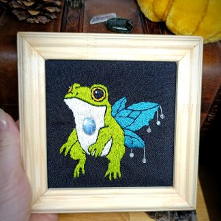 Broderie sous cadre 